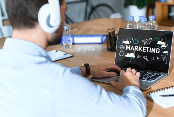 cropped shot of businessman in headphones listening music and wo How to Choose the Right Digital Marketing Agency for Your Brand