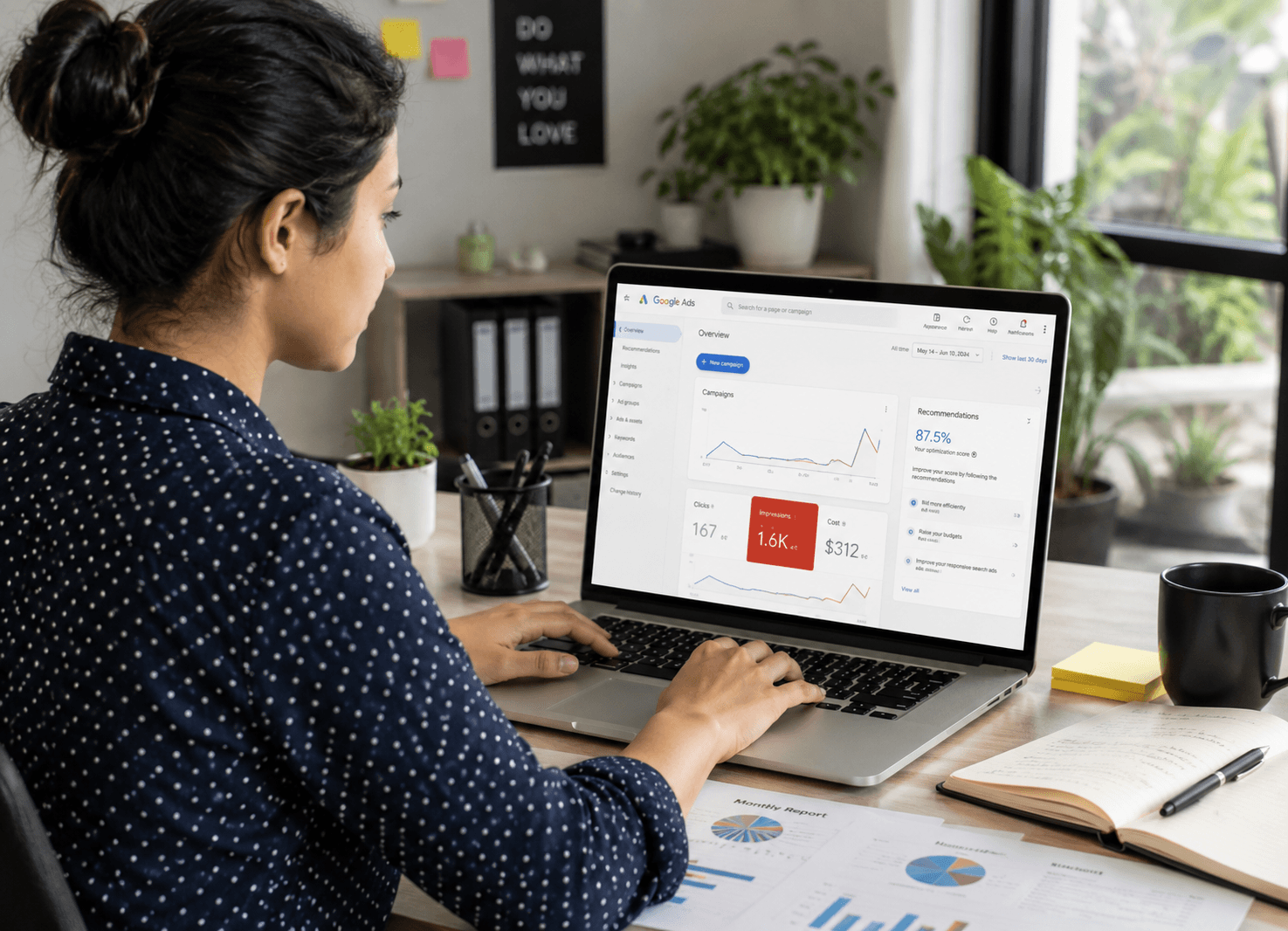 Digital marketing professional creating Google Ads content strategy on a laptop in a modern office workspace to support business growth and lead generation.